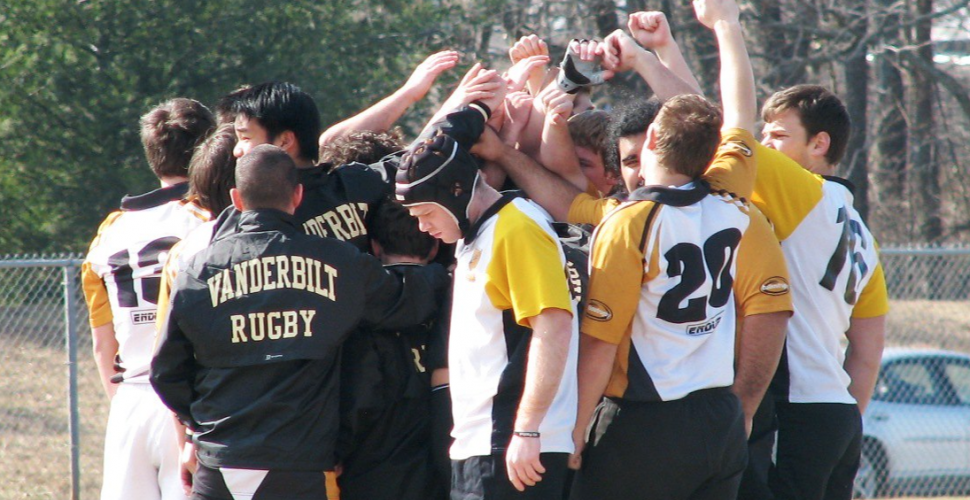 team gathers for a cheer before the match